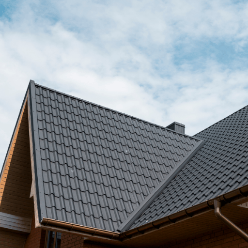 Standing seam metal roof installation with clean lines and durable panels completed by Dinosaur Roofing & Repair, providing long-term weather protection and low-maintenance roofing solutions for homes in Middle Georgia